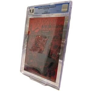 A NIGHTMARE ON ELM STREET FEARBOOK RED LEATHER VARIANT 9.8 CRACKED CASE
